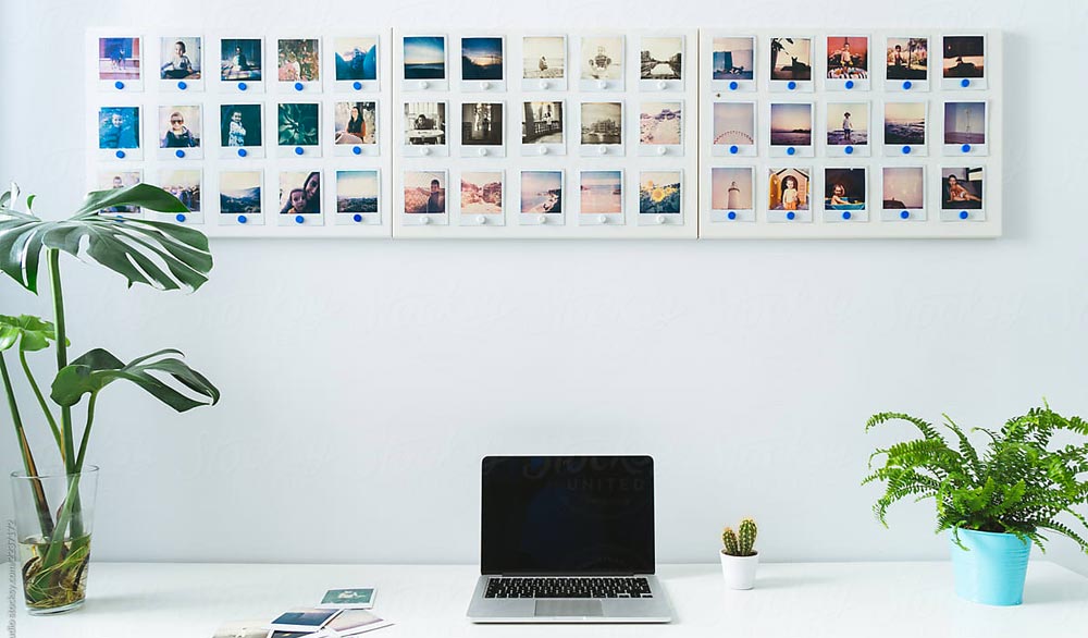 Organized photos on the wall for digital scrapbooking