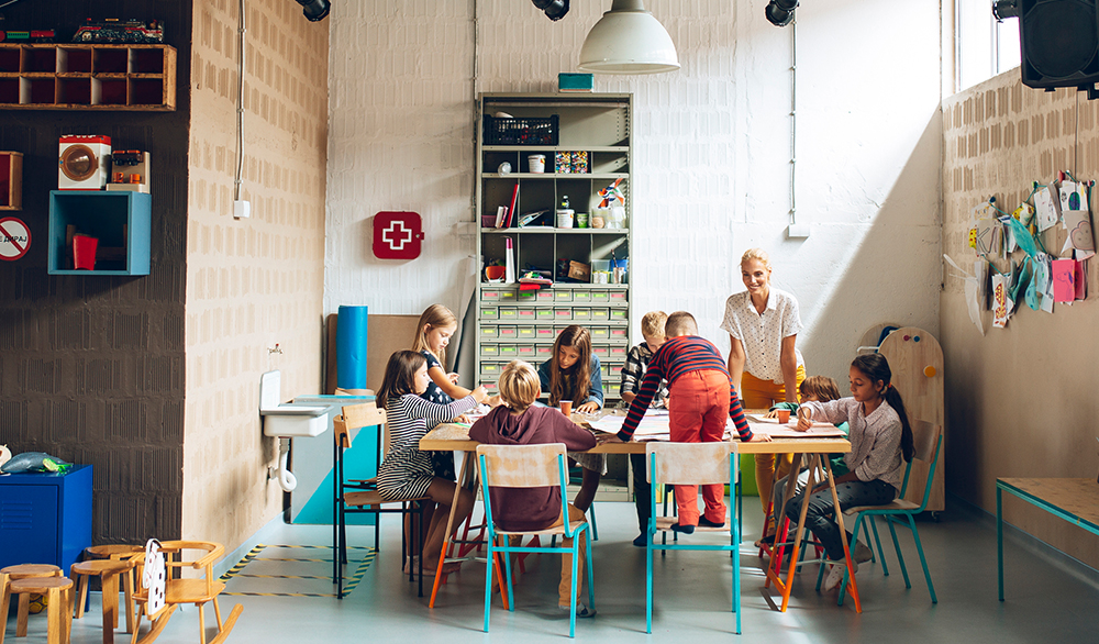 Teacher and children in a classroom