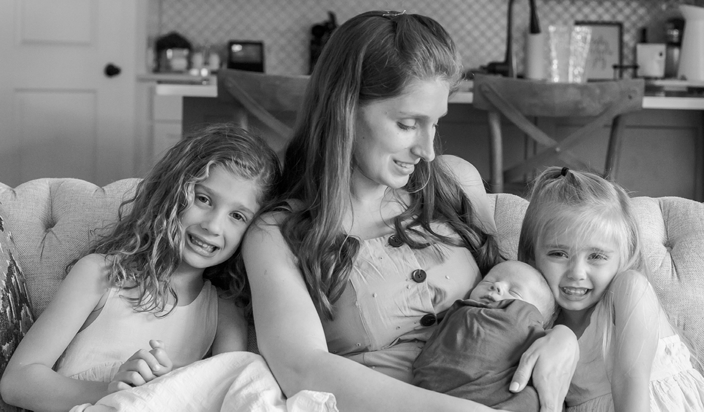 A mother with her 3 children