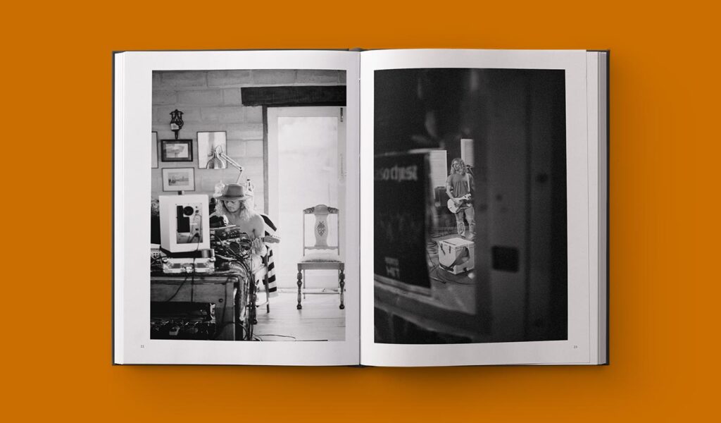 Open Book Showcasing Black & White Photographs
