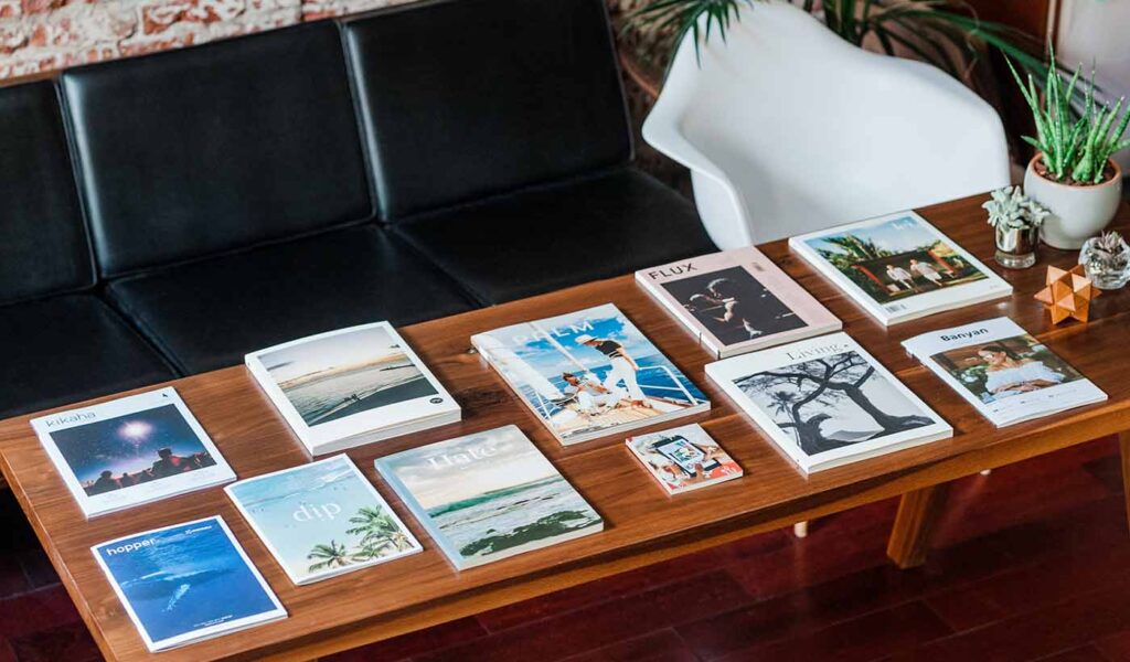 Eleven Coffee Table Photo Books Sitting on a Table