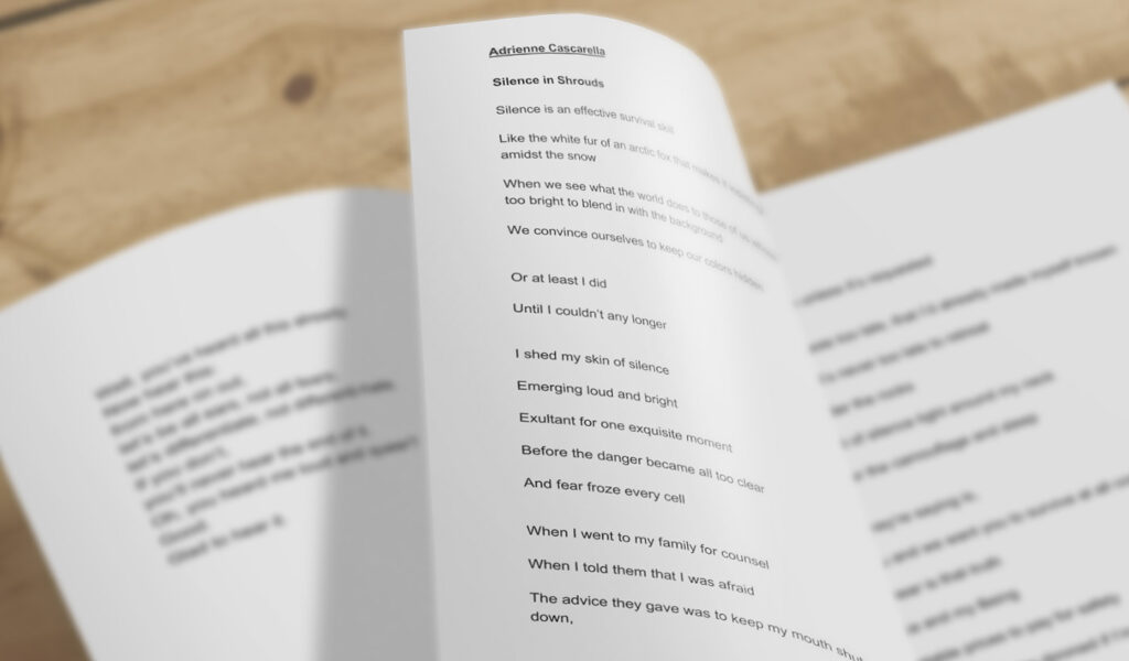 Close up of book pages showing poetry.
