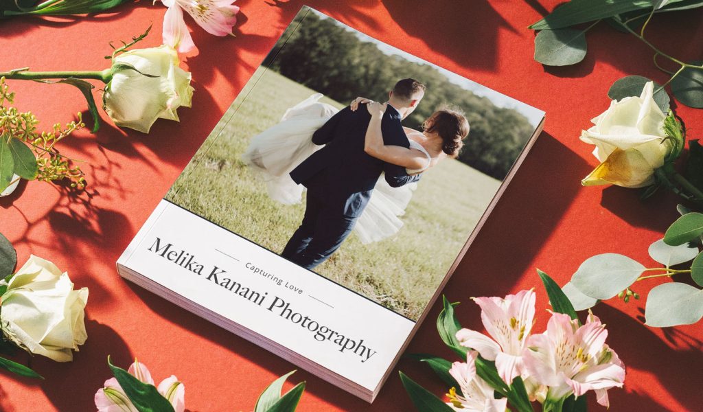 Wedding photo book featuring a married couple on the cover