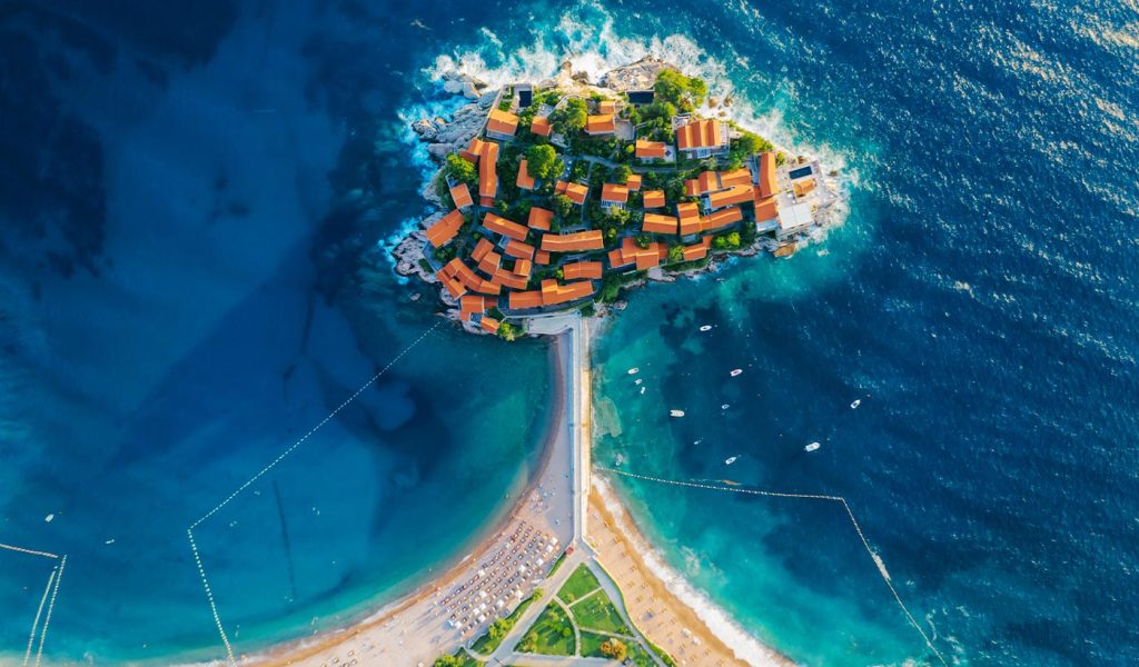 Aerial photography of an island in the middle of the ocean